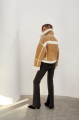 Stylish short sand-colored sheepskin coat made of natural sheepskin