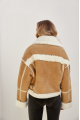 Stylish short sand-colored sheepskin coat made of natural sheepskin