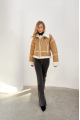 Stylish short sand-colored sheepskin coat made of natural sheepskin