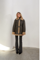 Stylish vintage sheepskin coat of gray color made of natural sheepskin