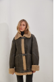 Stylish vintage sheepskin coat of gray color made of natural sheepskin