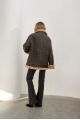 Stylish vintage sheepskin coat of gray color made of natural sheepskin