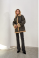 Stylish vintage sheepskin coat of gray color made of natural sheepskin