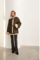 Stylish brown sheepskin coat made of natural sheepskin in VINTAGE style