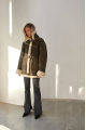 Stylish brown sheepskin coat made of natural sheepskin in VINTAGE style