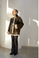 Stylish brown sheepskin coat made of natural sheepskin in VINTAGE style