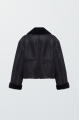 Short black sheepskin coat