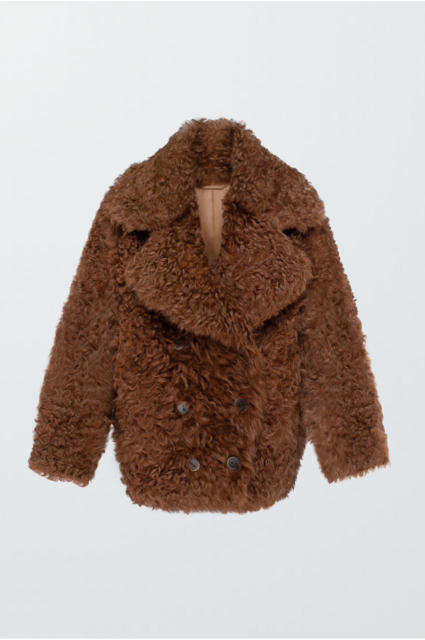 Double-sided curly brown sheepskin coat made of natural sheepskin in OVERSIZE style
