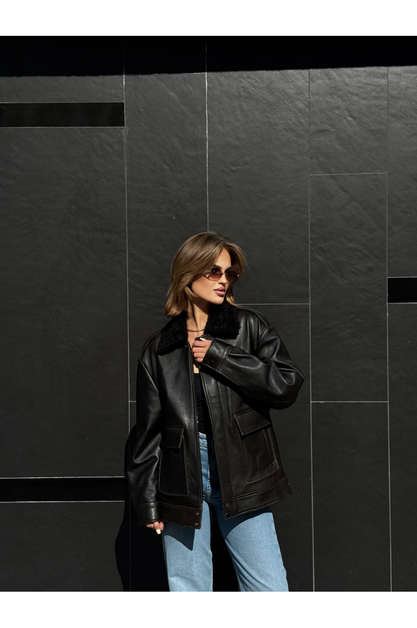 Women's black leather jacket with fur collar
