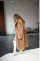 Long double-sided sheepskin coat made of natural sheepskin in brown color