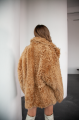 Women's two-sided sheepskin jacket made of natural caramel colored sheepskin