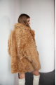 Women's two-sided sheepskin jacket made of natural caramel colored sheepskin