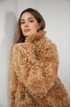 Women's two-sided sheepskin jacket made of natural caramel colored sheepskin