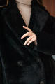 Women's two-sided sheepskin jacket made of natural black colored sheepskin