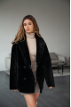 Women's two-sided sheepskin jacket made of natural black colored sheepskin