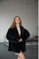 Women's two-sided sheepskin jacket made of natural black colored sheepskin