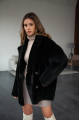 Women's two-sided sheepskin jacket made of natural black colored sheepskin