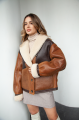 Women's sheepskin coat in VINTAGE style and a stylish combination of dark chocolate and whiskey colors