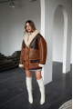 Long women's sheepskin coat in VINTAGE style and a stylish combination of dark chocolate and whiskey colors