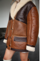 Long women's sheepskin coat in VINTAGE style and a stylish combination of dark chocolate and whiskey colors