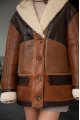 Long women's sheepskin coat in VINTAGE style and a stylish combination of dark chocolate and whiskey colors