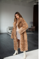 Long two-sided sheepskin coat made of natural sheepskin in camel color