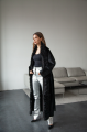 Long sheepskin coat made of natural sheepskin in black color