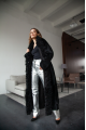 Long sheepskin coat made of natural sheepskin in black color