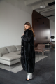 Long sheepskin coat made of natural sheepskin in black color