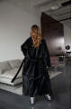 Long sheepskin coat made of natural sheepskin in black color