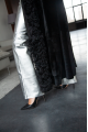 Long sheepskin coat made of natural sheepskin in black color