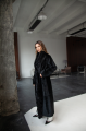 Long sheepskin coat made of natural sheepskin in black color