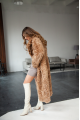 Long two-sided sheepskin coat made of natural sheepskin in camel color