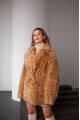 Women's two-sided sheepskin jacket made of natural caramel colored sheepskin