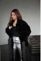 Long black sheepskin coat made of natural sheepskin with a down jacket