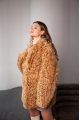 Women's two-sided sheepskin jacket made of natural caramel colored sheepskin