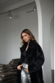 Long sheepskin coat made of black natural sheepskin