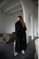 Long sheepskin coat made of black natural sheepskin