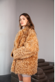 Women's two-sided sheepskin jacket made of natural caramel colored sheepskin