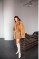 Women's two-sided sheepskin jacket made of natural caramel colored sheepskin