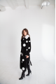 Long sheepskin coat made of black natural sheepskin with a pea print