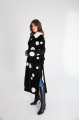 Long sheepskin coat made of black natural sheepskin with a pea print