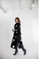 Long sheepskin coat made of black natural sheepskin with a pea print