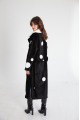 Long sheepskin coat made of black natural sheepskin with a pea print