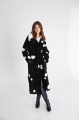 Long sheepskin coat made of black natural sheepskin with a pea print