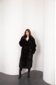 Long sheepskin coat made of natural black cashmere lamb