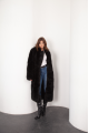 Long sheepskin coat made of natural black cashmere lamb