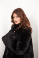 Long sheepskin coat made of natural black cashmere lamb