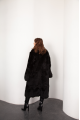 Long sheepskin coat made of natural black cashmere lamb