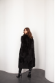 Long sheepskin coat made of natural black cashmere lamb